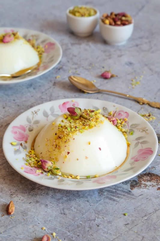 <p>Muhalabieh is a creamy Middle Eastern milk pudding infused with rose water and topped with crushed pistachios.</p><p><strong>Get the recipe: <a href="https://littlesunnykitchen.com/muhalabieh/" rel="nofollow noopener" target="_blank" data-ylk="slk:Muhalabieh (Middle Eastern Milk Pudding Dessert);elm:context_link;itc:0;sec:content-canvas" class="link ">Muhalabieh (Middle Eastern Milk Pudding Dessert)</a></strong></p>