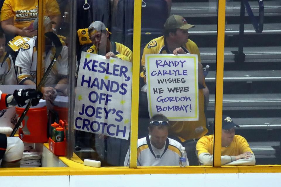 <p>Nashville Predators fans hold signs during the first period in Game Three of the Western Conference Final between the Anaheim Ducks and the Nashville Predators during the 2017 Stanley Cup Playoffs at Bridgestone Arena on May 16, 2017 in Nashville, Tennessee. (Photo by Frederick Breedon/Getty Images) </p>