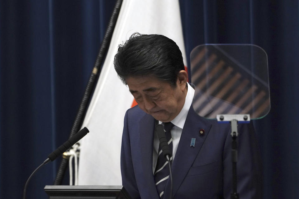 Japanese Prime Minister Shinzo Abe bows as he delivers his speech at the Prime Minister's office in Tokyo Saturday, Feb. 29, 2020. (AP Photo/Eugene Hoshiko)