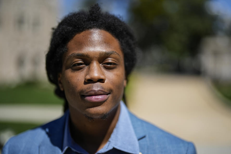 Davante Jennings poses for a photo at the state Capitol, Thursday, March 28, 2024, in Atlanta. Not long ago, Jennings was not even an active voter. He had given up on politics after the 2016 presidential election, his first time voting. But he was targeted by the New Georgia Project ahead of the 2022 elections and now helps reach out to would-be voters. (AP Photo/Mike Stewart)