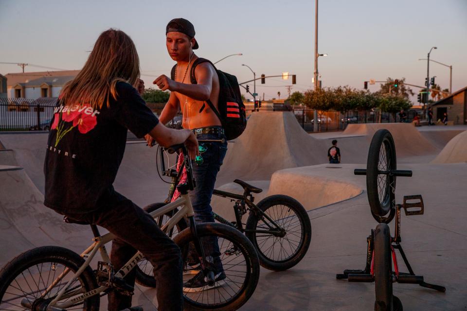 Young people hang out at Sidewinder Skatepark in El Centro, Calif., on July 7, 2021. The City of El Centro consistently ranks as having the highest unemployment rate in the country.