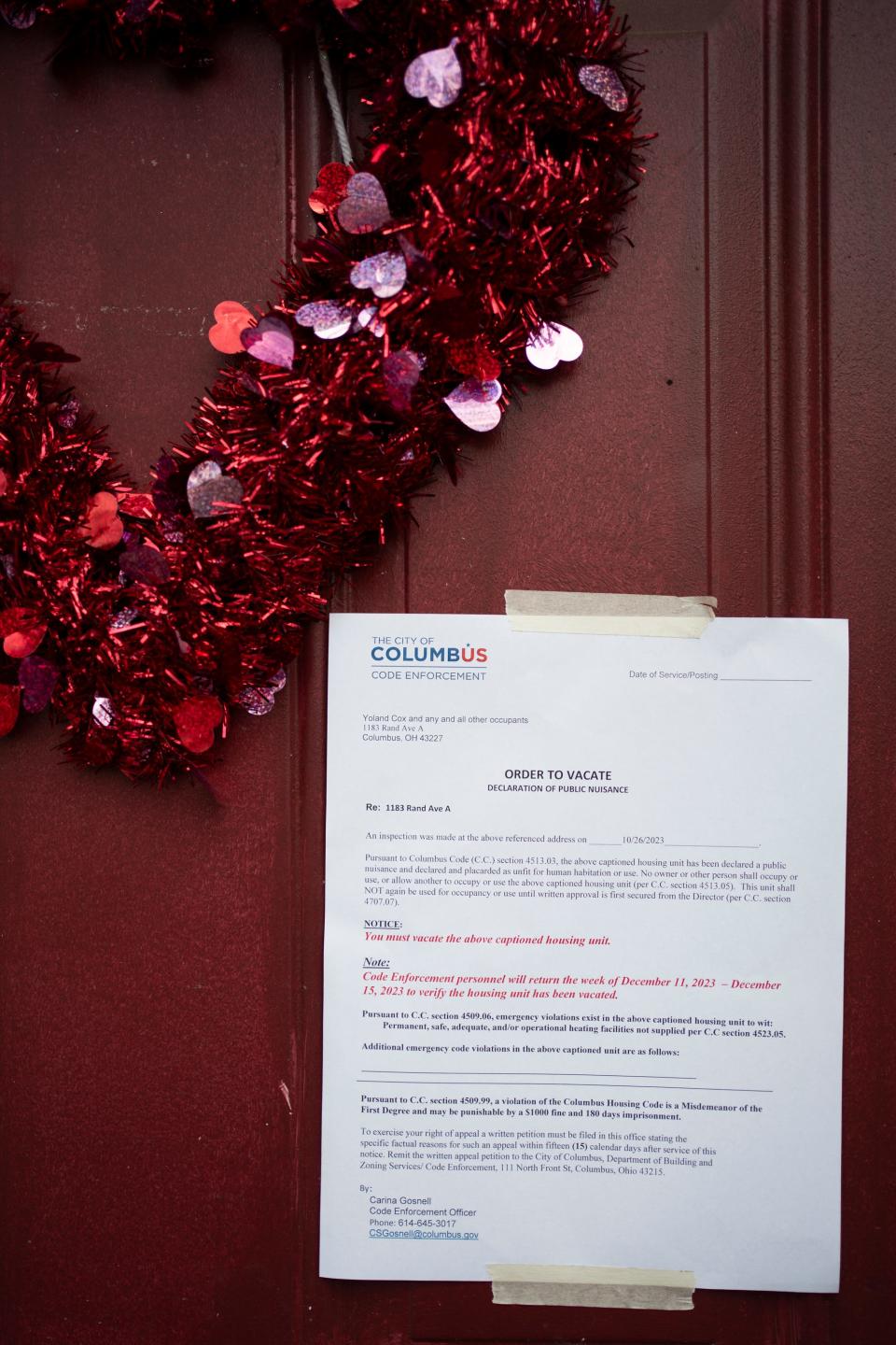 An order to vacate hangs on a door Dec. 8 in Colonial Village, noting the management has given all of its residents until Dec. 31 to find new housing. So far, the Community Shelter Board has helped 254 households relocate to hotels. It is not possible at this time to discern how many households remain because each apartment at Colonial Village is often found to be home to multiple households.