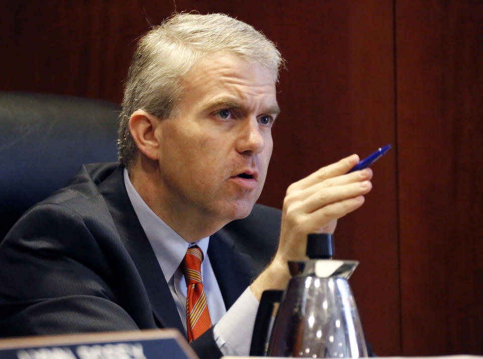 Public Service Commissioner of the Northern District Brandon Presley discusses a proposed net metering rule during their open meeting at their offices in Jackson, Miss., on April 7, 2015. (Rogelio V. Solis/AP)