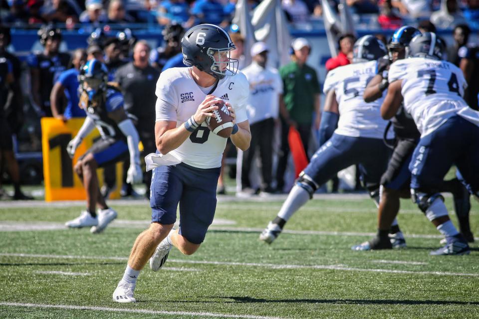 Georgia Southern quarterback Kyle Vantrese looks downfield for a receiver against Georgia State on Saturday at Center Parc Stadium in Atlanta. He ws 30-of-49 passing for 359 yards, three touchdowns and four iinterceptions. 