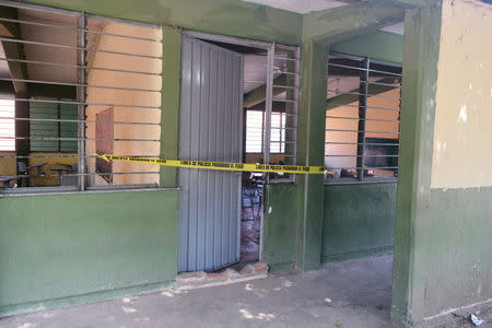 Yellow tape is seen at a school damaged by an earthquake in Ciudad Hidalgo, in Chiapas state, Mexico February 1, 2019. REUTERS/Jose Torres