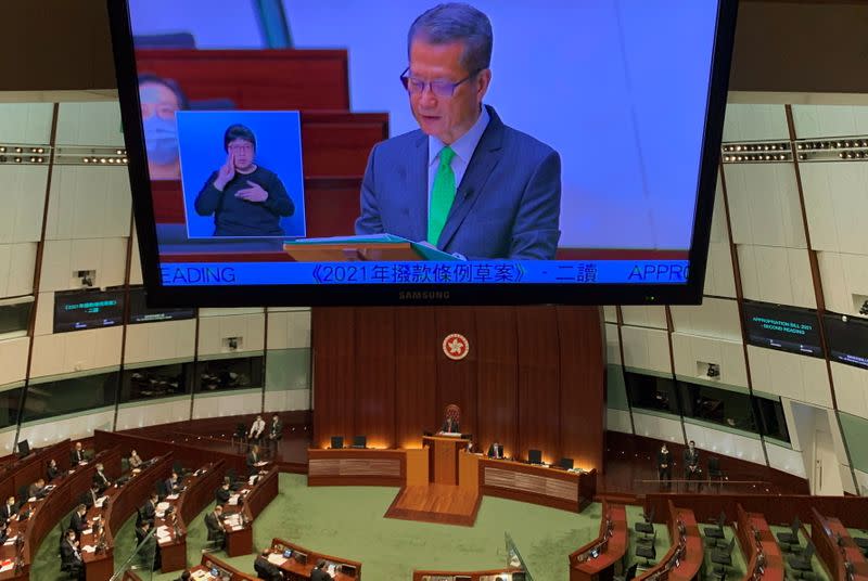 Hong Kong's Finance Secretary Paul Chan delivers the annual budget address at the Legislative Council in Hong Kong