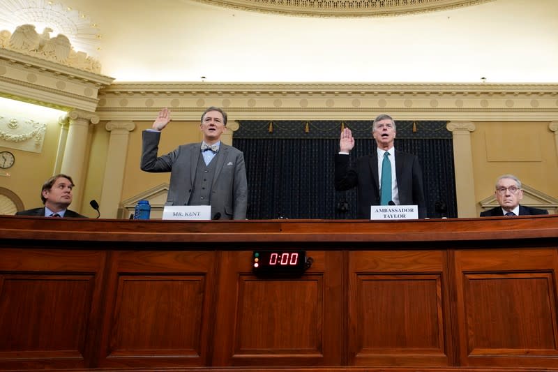 Taylor and Kent are sworn in at House Intelligence Committee hearing as part of Trump impeachment inquiry on Capitol Hill in Washington