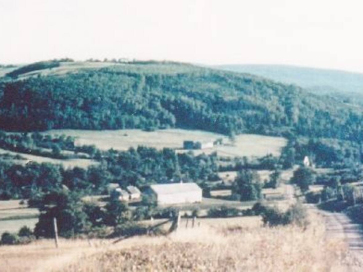 The former community of Coote Hill, N.B. seen from Headline Hill. Coote Hill disappeared with 19 other communities in the expropriation of land for CFB Gagetown, announced on July 26, 1952. (Eldon Graham/Base Gagetown Community History Association - image credit)