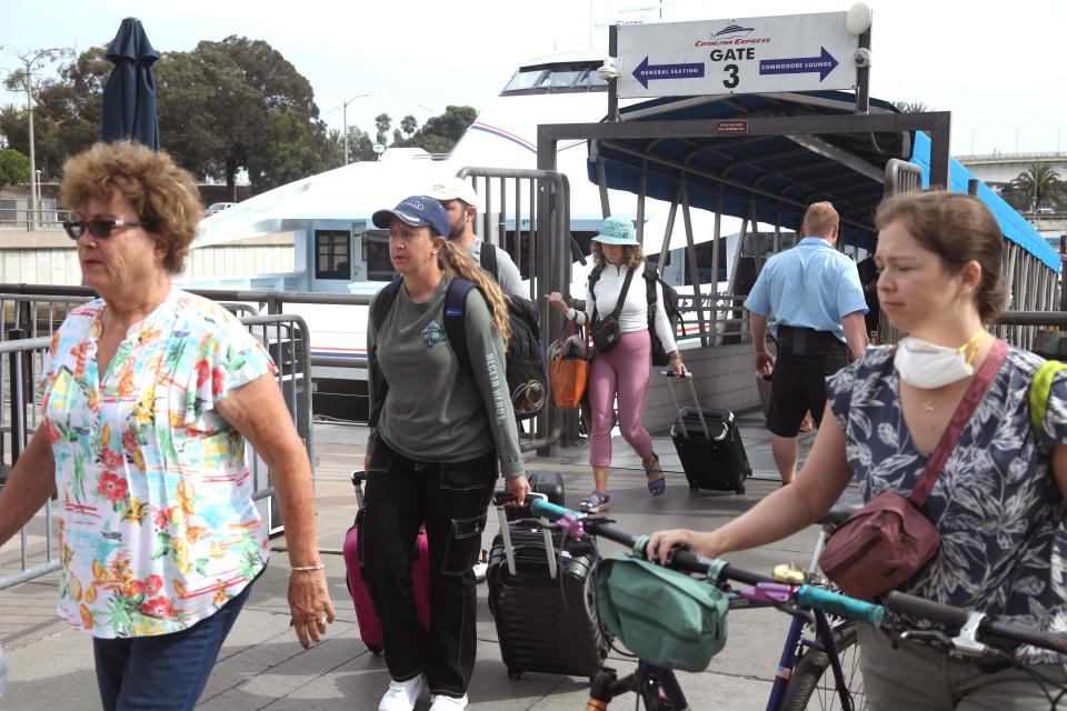 Evacuees from Catalina Island arrive in Long Beach, California, after leaving due to Hurricane Hilary. Aug. 19, 2023.  / Credit: Genaro Molina / Los Angeles Times via Getty Images