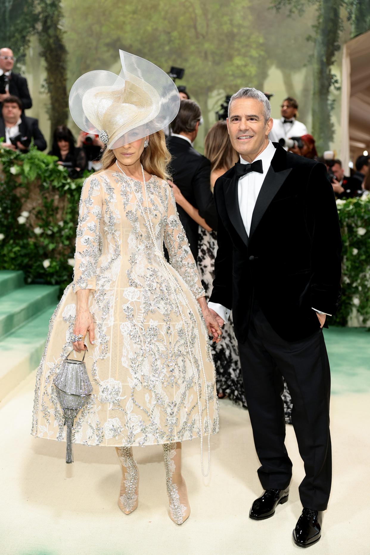 (L-R) Sarah Jessica Parker and Andy Cohen attend The 2024 Met Gala Celebrating "Sleeping Beauties: Reawakening Fashion" at The Metropolitan Museum of Art on May 6, 2024 in New York City.