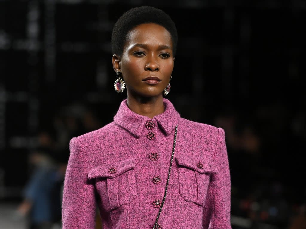 A model walks at Chanel’s A/W 2022 show during Paris Fashion Week (Getty Images)