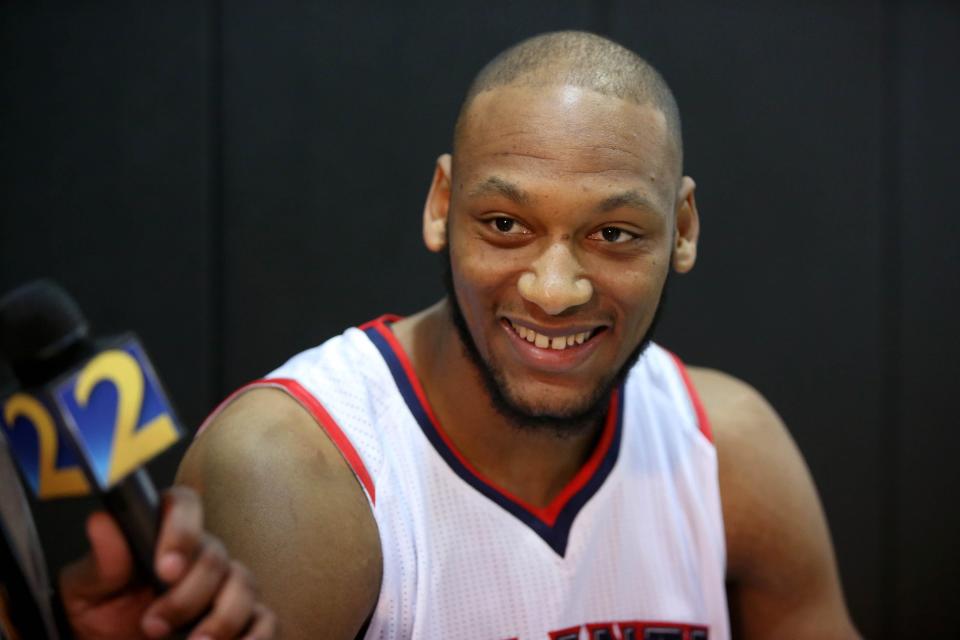 Sep 29, 2014; Atlanta, GA, USA; Atlanta Hawks forward Adreian Payne (33) talks to members of the media during the Atlanta Hawks media day at Philips Arena. Mandatory Credit: Jason Getz-USA TODAY Sports