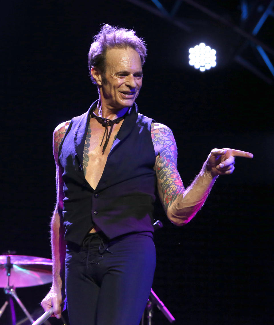FILE - This Sept. 28, 2015 file photo shows David Lee Roth performing at Ak-Chin Pavillion in Phoenix, Ariz. Roth, the high-kicking lead singer of the rock band Van Halen, will have a mini-residence at the House of Blues Las Vegas in the Mandalay Bay Resort and Casino. He’ll be performing Jan. 8, Jan. 10-11 and March 18, March 20-21, March 25, and March 27-28. Tickets go on sale Saturday.(Photo by Rick Scuteri/Invision/AP, File)