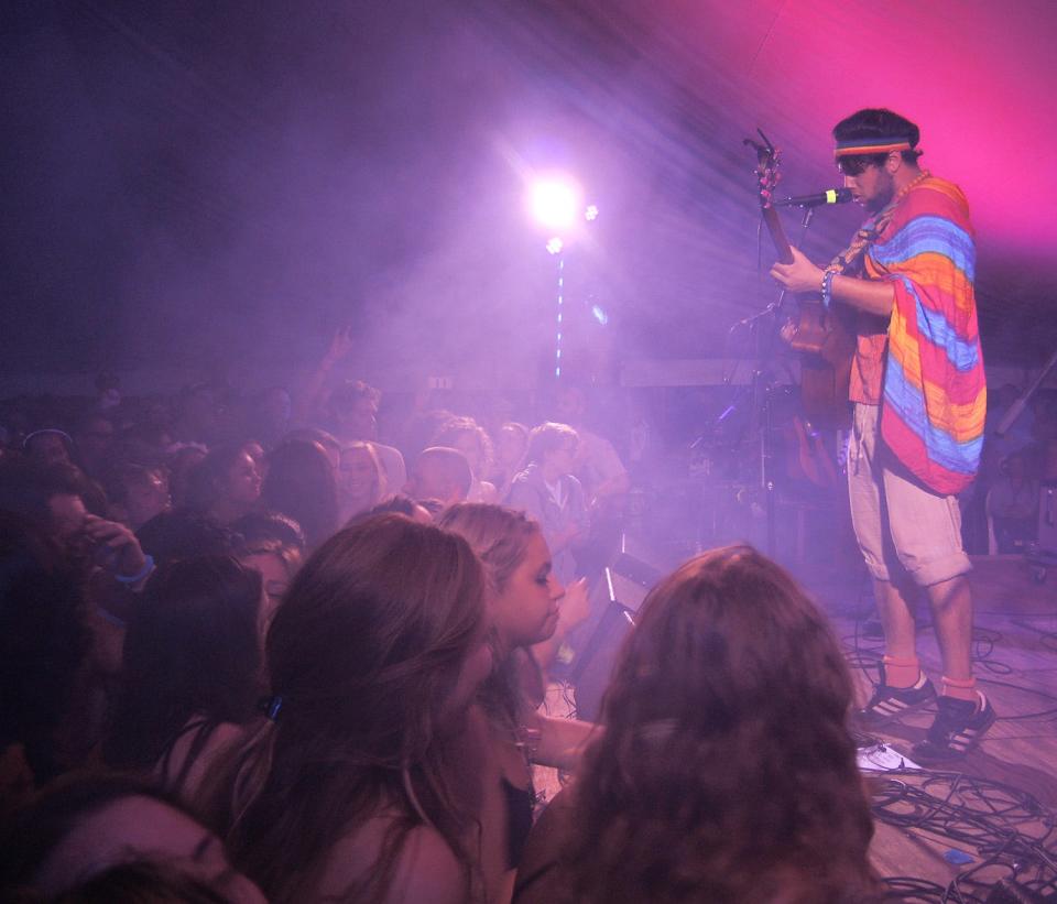 Joe Hertler (left) and the Rainbow Seekers perform to a crowded audience at the 2021 Blissfest. The group is set to return for the 2023 festival.