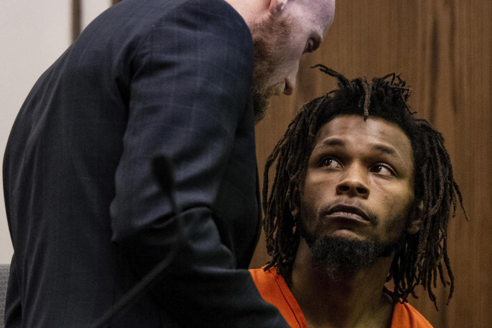 Nicholas Jordan, 25, speaks with his legal counsel during his first appearance in El Paso County 4th Judicial Court, Friday, Feb. 23, 2024, in Colorado Springs, Colo. Jordan was arrested Monday, Feb. 19, in the deaths of his roommate, Samuel Knopp, 24, and Celie Rain Montgomery, 26, at the University of Colorado Colorado Springs. (Parker Seibold/The Gazette via AP, Pool)