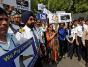 Jet Airways employees and their family members attend a protest demanding to "save Jet Airways" in New Delhi, India, April 18, 2019. REUTERS/Adnan Abidi