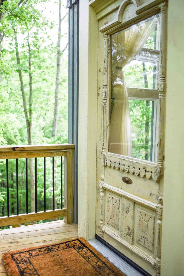 The 170-year-old treehouse door had a former life in a Shelbyville, Tennessee mansion that operated as a hospital during the Civil War. Photo credit: Susan Dyer.