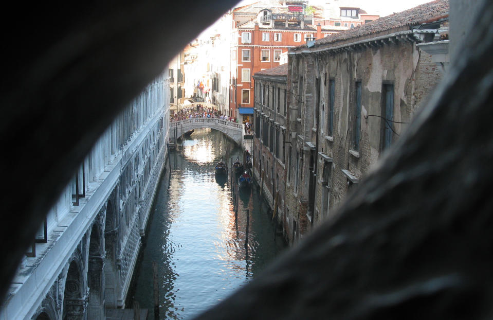 This July 17, 2012 photo shows a view from the Bridge of Sighs onto the canals of Venice, Italy. To travel through northern Italy with a copy of Mark Twain’s 1869 ‘'The Innocents Abroad', his classic 'record of a pleasure trip'. It took him to the great sights of Europe and on to Constantinople and Jerusalem before he sailed home to New York. Such a trip would take far too big a chunk out of my holiday time. But, Milan, Florence and Venice, a mere fragment for Twain, was within my reach for a two-week vacation. (AP Photo/Raf Casert)