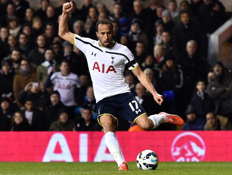 Tottenham Hotspur's English midfielder Andros Townsend runs with the ball before scoring a goal during the English Premier League football match between Tottenham Hotspurs and Swansea City at White Hart Lane in London on March 4, 2015