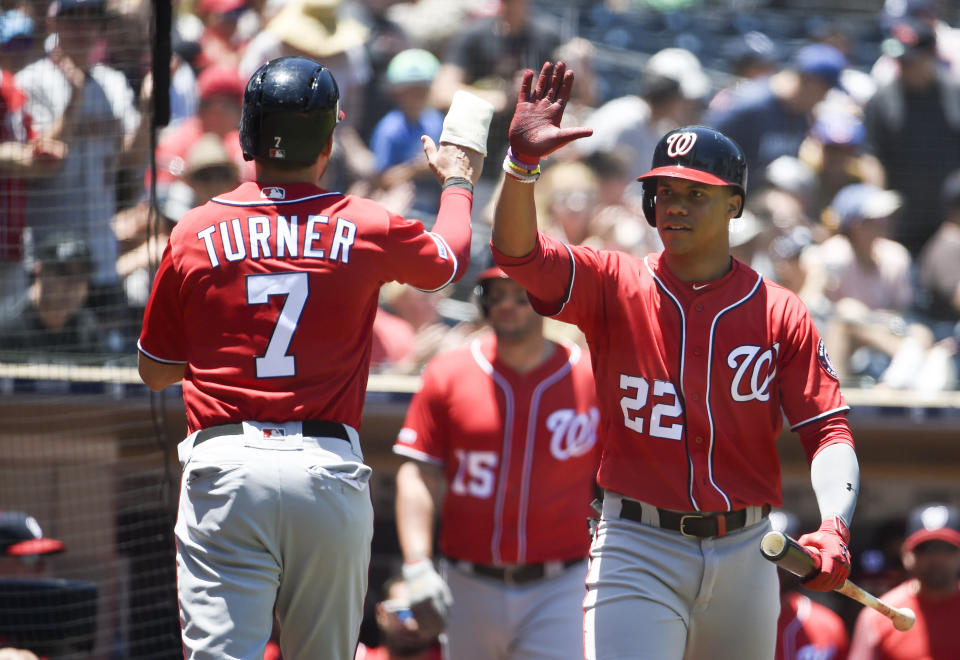 SAN DIEGO, CA - JUNE 9:  Trea Turner #7 of the Washington Nationals is congratulated by Juan Soto #22 after scoring during the first inning of a baseball game against the San Diego Padres at Petco Park June 9, 2019 in San Diego, California.  (Photo by Denis Poroy/Getty Images)