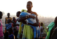 A woman waits to be registered prior to a food distribution carried out by the United Nations World Food Programme (WFP) in Thonyor, Leer state, South Sudan, February 26, 2017. REUTERS/Siegfried Modola