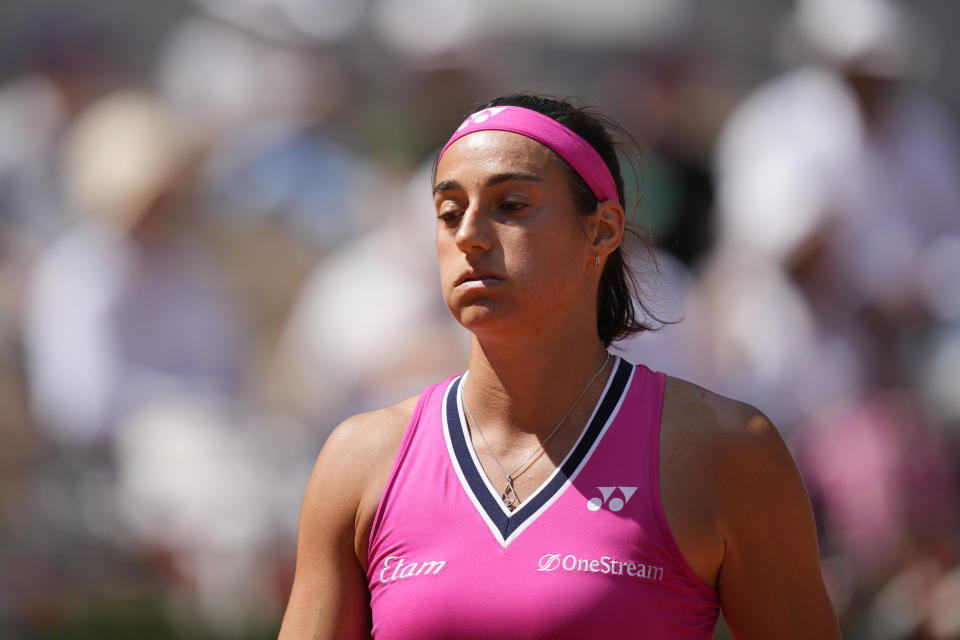 France's Caroline Garcia reacts after missing a shot against Russia's Anna Blinkova during their second round match of the French Open tennis tournament at the Roland Garros stadium in Paris, Wednesday, May 31, 2023. (AP Photo/Thibault Camus)