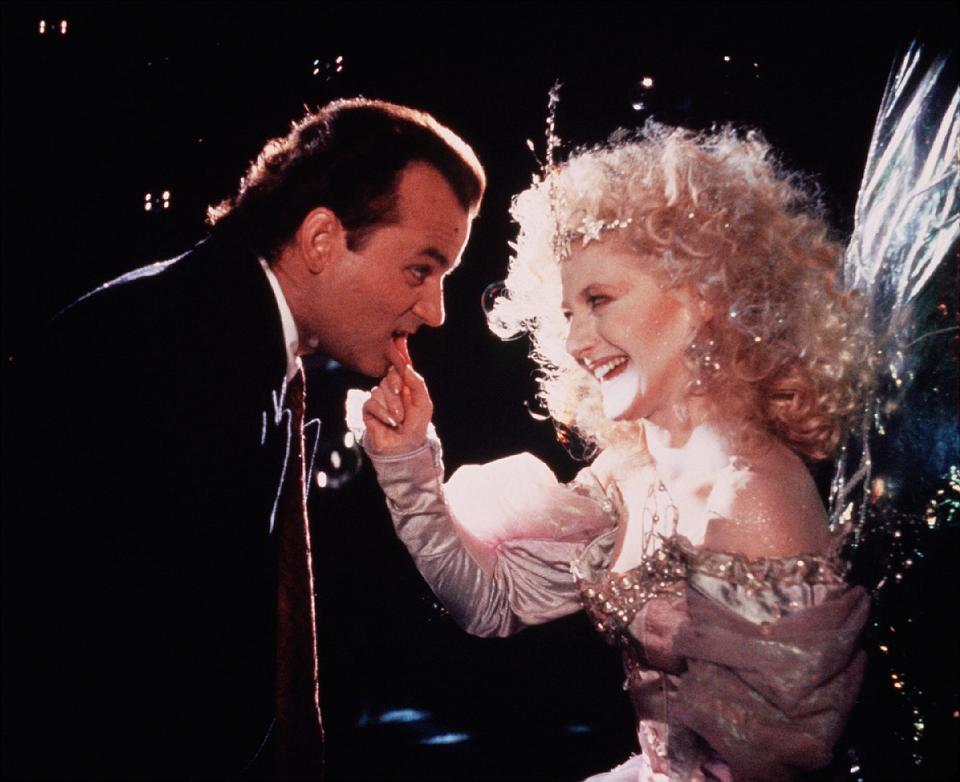 Frank Cross (Bill Murray) encounters a playfully vicious fairy (Carol Kane) in &quot;Scrooged.&quot;