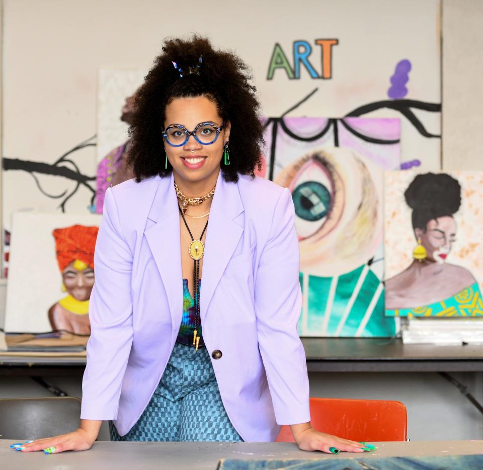 Ashley Palmer of Canton owns Palmystree and is an entrepreneur, freelance artist, graphic designer, web designer and musician. She's also an art teacher.