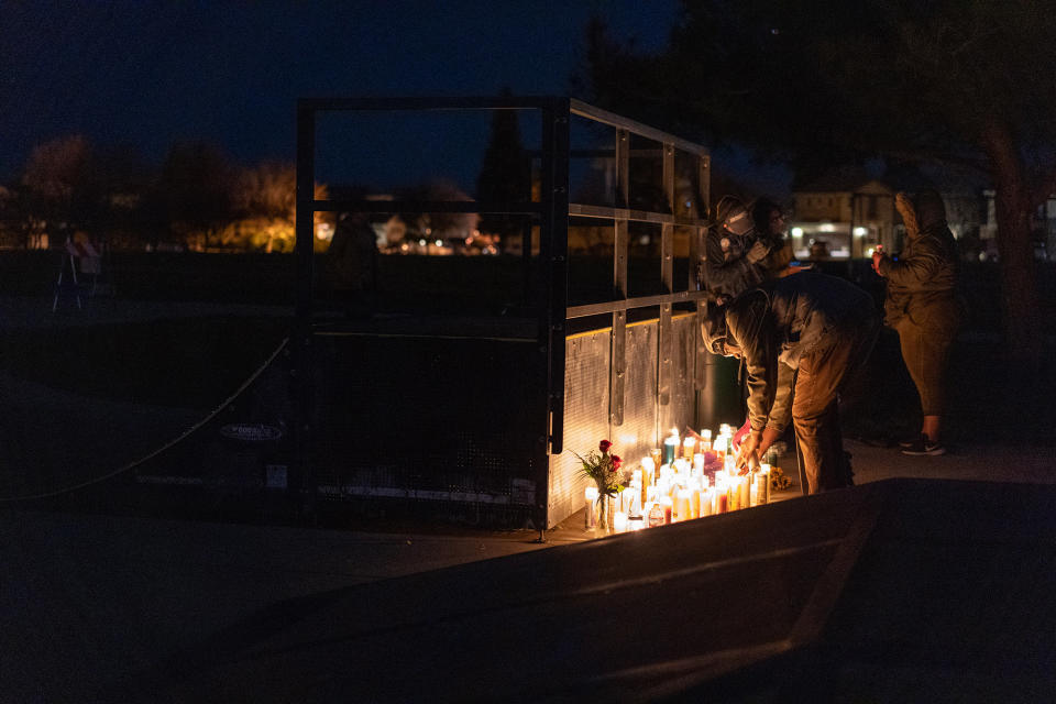 Candles are set up at a memorial for Nichols behind a skate ramp.