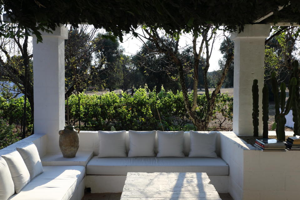 An outdoor deck surrounded  by trees