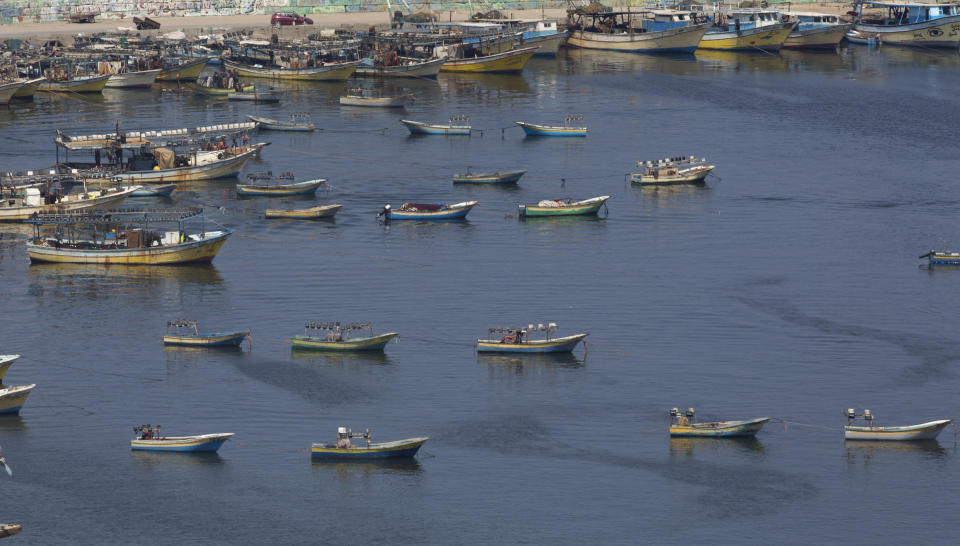 Palestinian fishing boats moored in the Gaza seaport in Gaza City, Thursday, June 13, 2019. The Israeli military took the rare step of closing the Gaza Strip's offshore waters to Palestinian fishermen Wednesday until further notice in response to incendiaries launched into Israel in recent days. (AP Photo/Hatem Moussa)