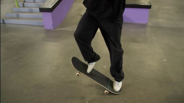 Push down on the tail of the board with your back foot, this will make it pop up.