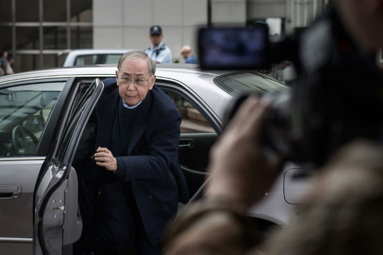 Hong Kong's former chief secretary Rafael Hui arrives at the high court in Hong Kong, in 2014