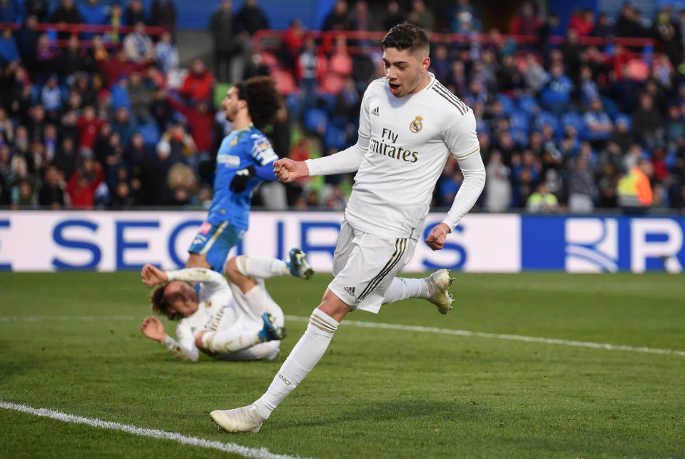 GETAFE, SPAIN - JANUARY 04: Federico Valverde of Real Madrid celebrates after teammate Luka Modric scored his team's third goal during the La Liga match between Getafe CF and Real Madrid CF at Coliseum Alfonso Perez on January 04, 2020 in Getafe, Spain. (Photo by Denis Doyle/Getty Images)