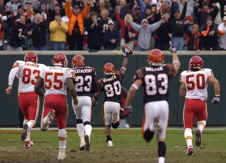 The Bengals' Peter Warrick returned a punt for a touchdown against the Chiefs on Nov. 16, 2003.