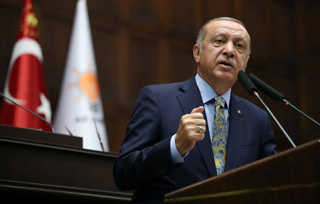 Turkish President Tayyip Erdogan addresses members of parliament from his ruling AK Party (AKP) during a meeting at the Turkish parliament in Ankara, Turkey, October 16, 2018. REUTERS/Umit Bektas