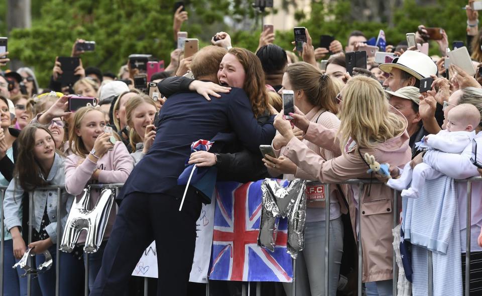 <p>Dreams came true for one red-headed royal fan in Australia, when she got a hug from Harry.</p>