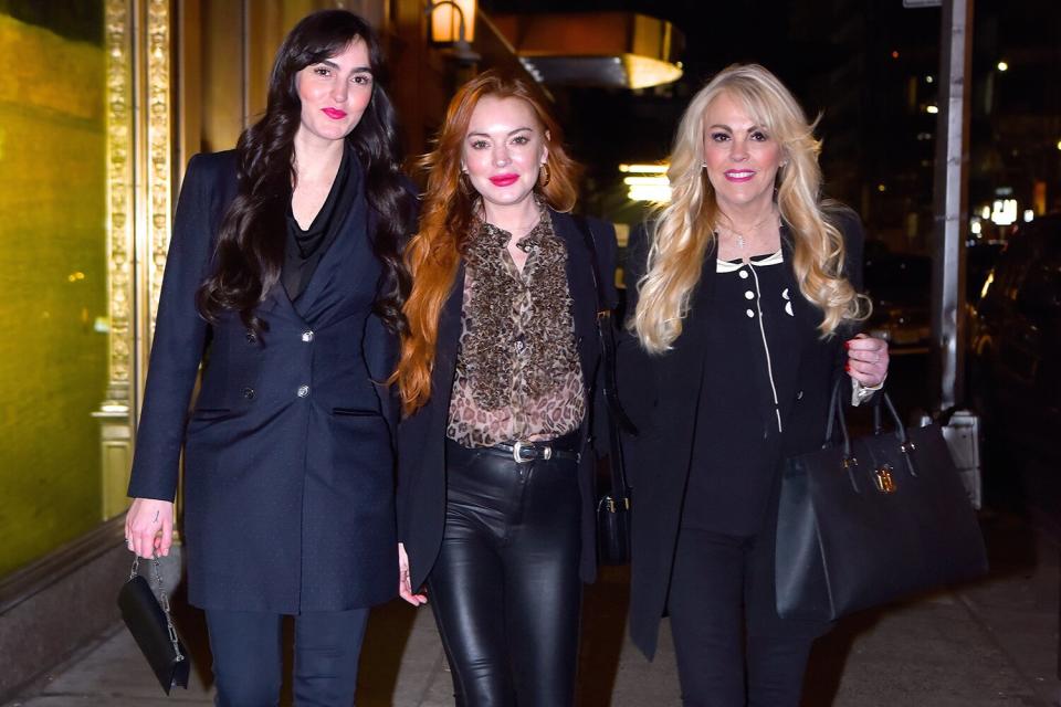 (L-R) Aliana Lohan, Lindsay Lohan and Dina Lohan are seen leaving the Polo Bar in Manhattan on March 25, 2019 in New York City.