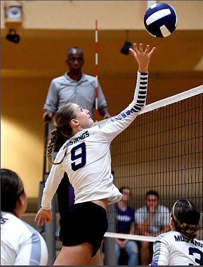 Wesleyan Christian School hitter Lydia Foster spikes the ball during volleyball action on Sept. 19, 2023, against Sperry at the WCS gym.