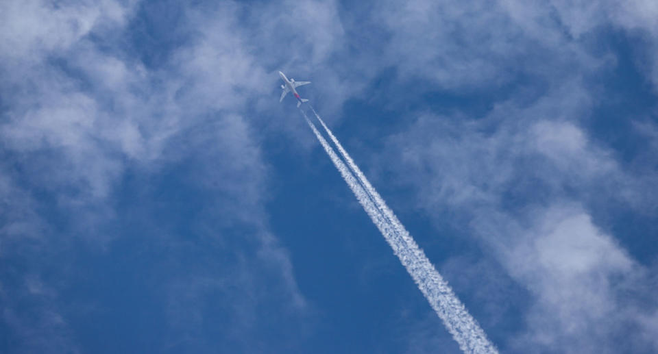 Contrail created by large aircraft shown after bizarre appearance in sky in Sydney. 