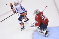 New York Islanders center Casey Cizikas (53) catches the puck in front of Washington Capitals goaltender Braden Holtby (70) during first-period NHL Eastern Conference Stanley Cup playoff hockey game action in Toronto, Thursday, Aug. 20, 2020. (Nathan Denette/The Canadian Press via AP)