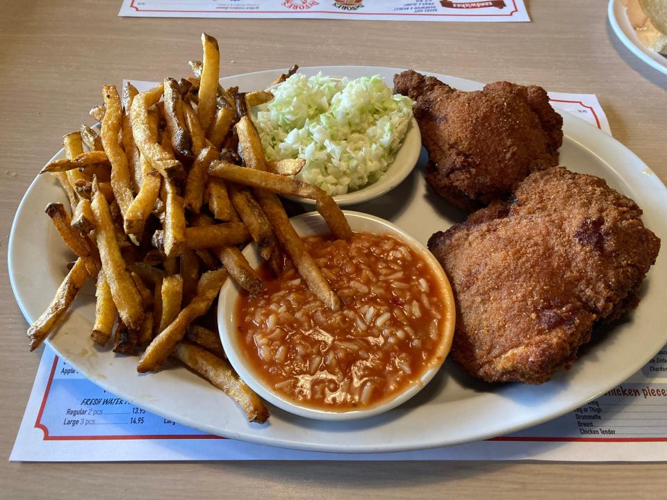 DeVore's Hopocan Gardens serves a chicken dinner with three thighs, hot sauce, coleslaw and french fries.