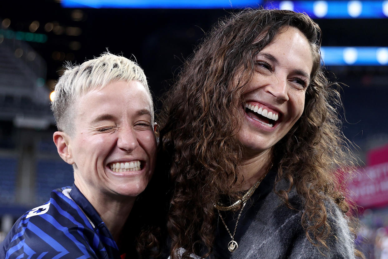 Megan Rapinoe hugs fiancée Sue Bird. (Steph Chambers/Getty Images)