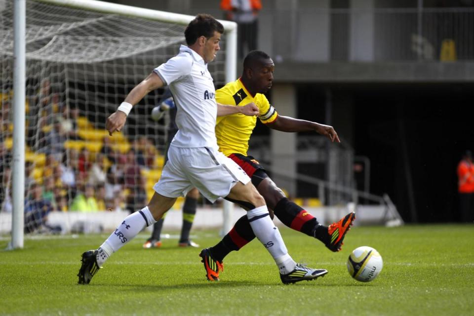 Lloyd Doyley in action against Tottenham's Gareth Bale in his 2012 testimonial pre-season game at Vicarage Road. <i>(Image: Action Images)</i>