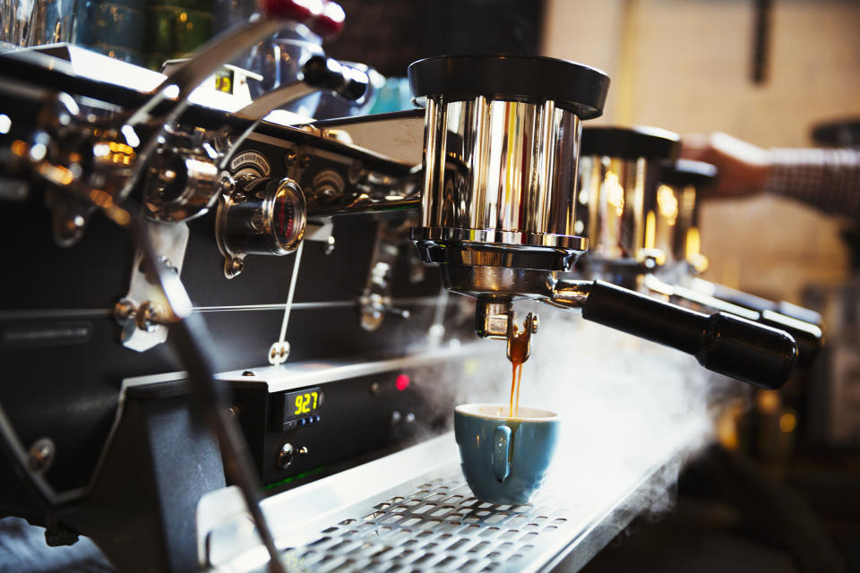 An espresso machine "uses 9-10 bars of pressure to push water through the grounds," says Sam Sabori, director of coffee at Intelligentsia. (Photo: Mint Images/Getty)