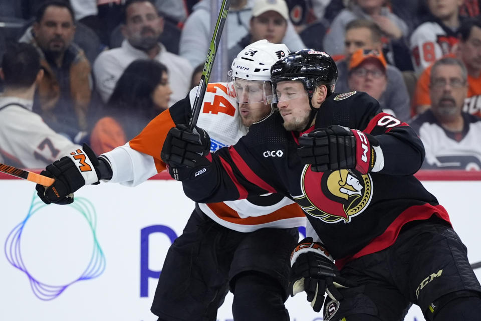 Philadelphia Flyers' Nick Seeler, left, and Ottawa Senators' Vladimir Tarasenko collide during the first period of an NHL hockey game, Saturday, March 2, 2024, in Philadelphia. (AP Photo/Matt Slocum)