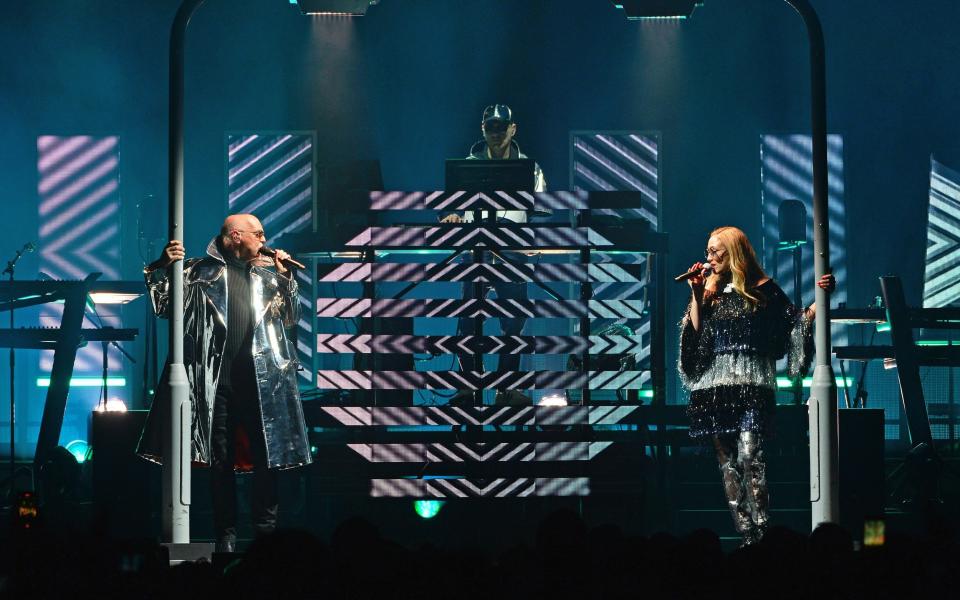 Tennant, Chris Lowe and Clare Uchima on stage on Sunday night - Getty Europe