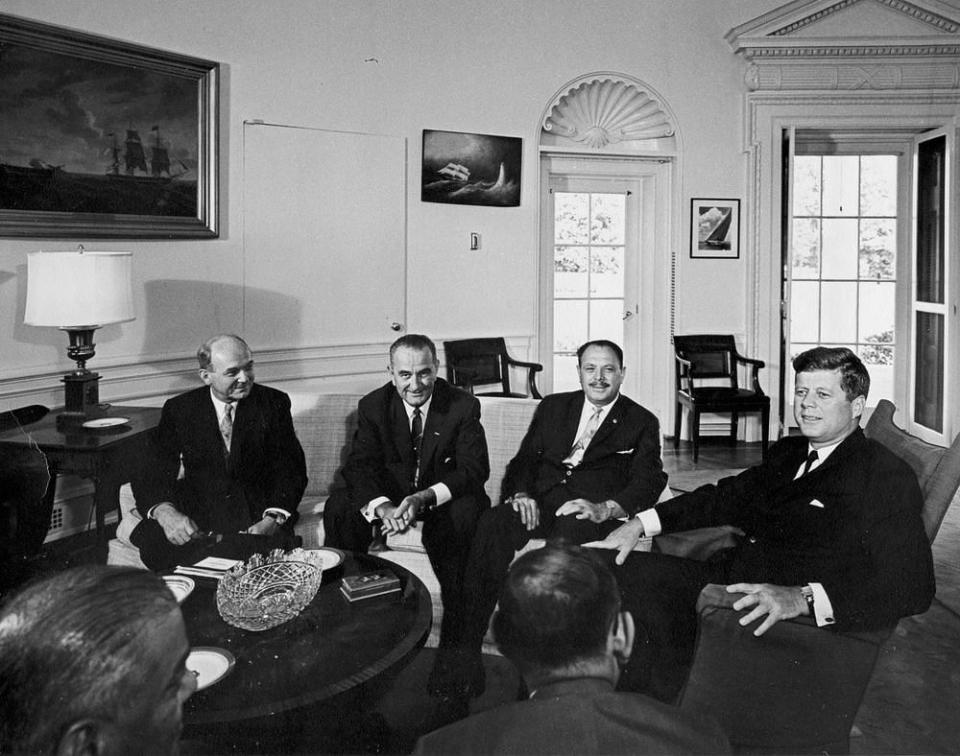 President John F. Kennedy Meets with Mohammad Ayub Khan, President of Pakistan; 11 July 1961. (L – R): Secretary of State Dean Rusk; Vice President Lyndon B. Johnson; President Mohammad Ayub Khan; President Kennedy (seated in fabric-covered rocking chair). 