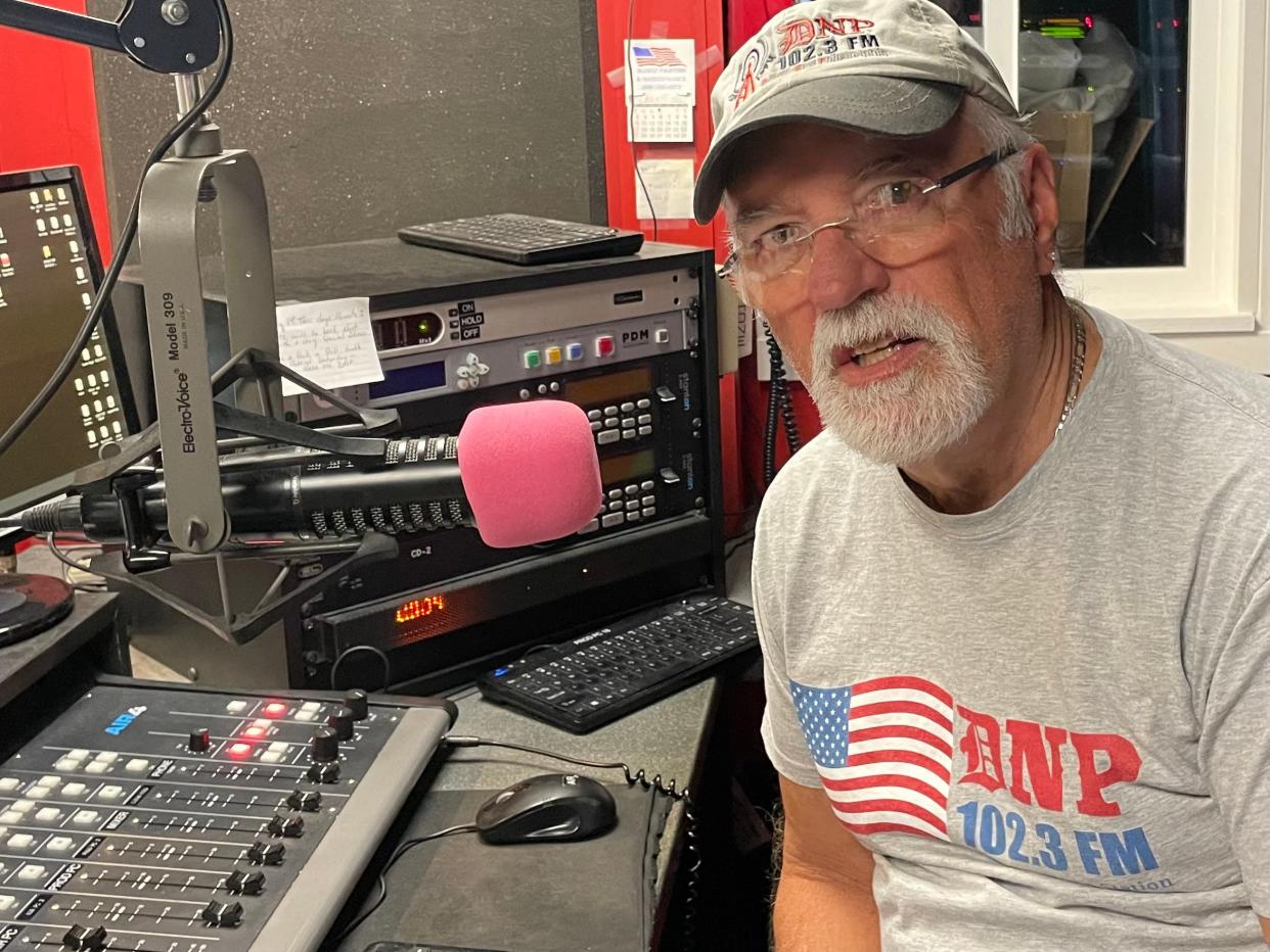 Larry Karoll, host of the DNP Morning Blitz on WDNP-FM (102.3), poses in the radio station's studio in downtown Dover.