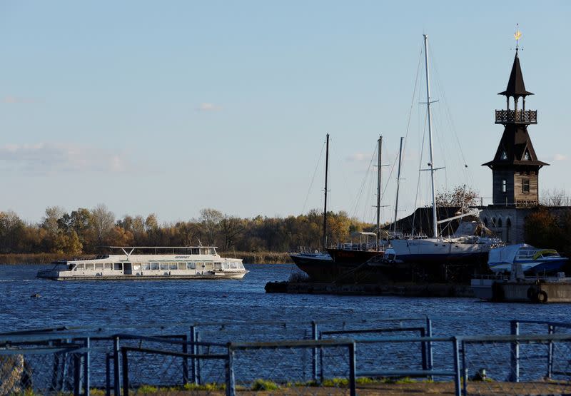 A ferry with civilian evacuees departs from Kherson River Port